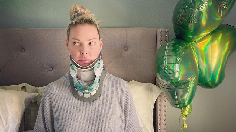 Katherine Heigl wearing neck brace