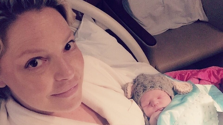 Katherine Heigl holding newborn son