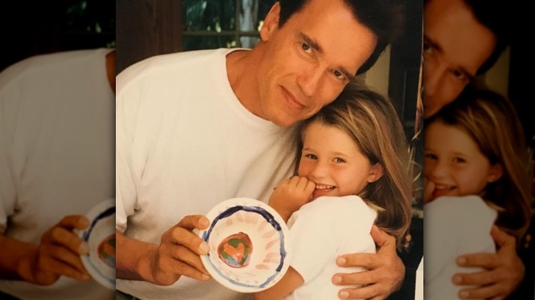 young Katherine Schwarzenegger with her dad