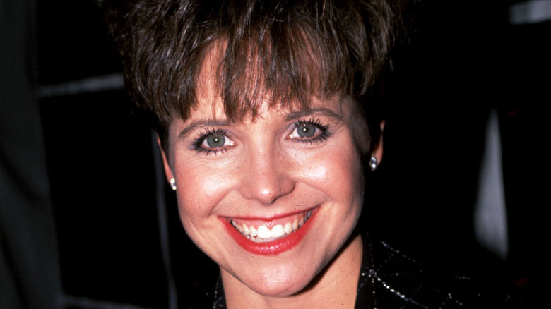 Katie Couric with short hair, smiling