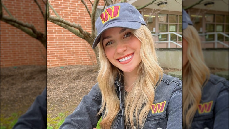 Katie Feeney in a Washington Commanders cap