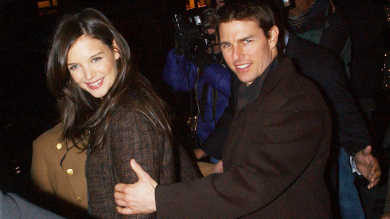 Katie Holmes and Tom Cruise smiling