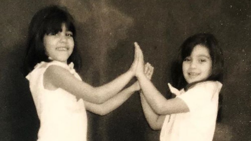 Kourtney Kardashian as a girl with her sister