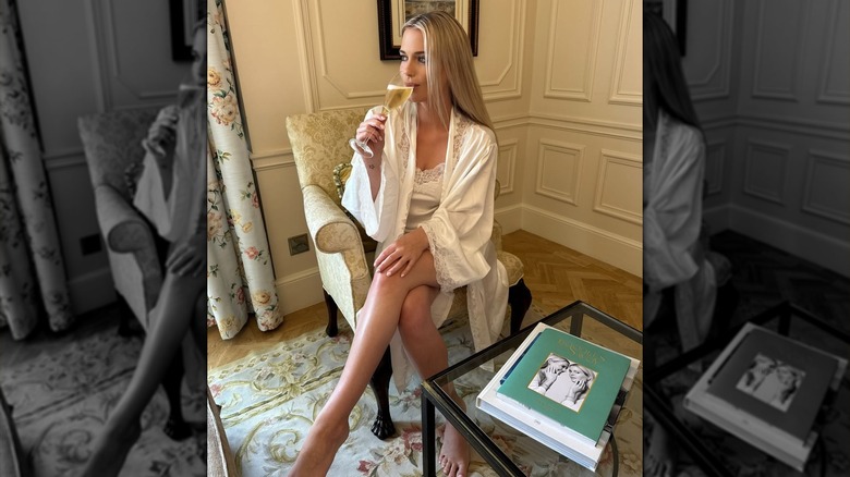 Lady Eliza Spencer sipping wine at the Savoy hotel