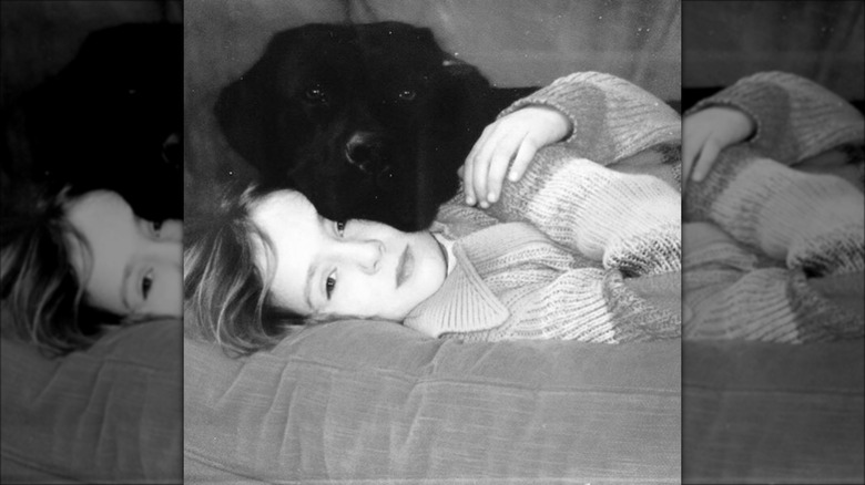 Lady Marina Windsor holding her dog