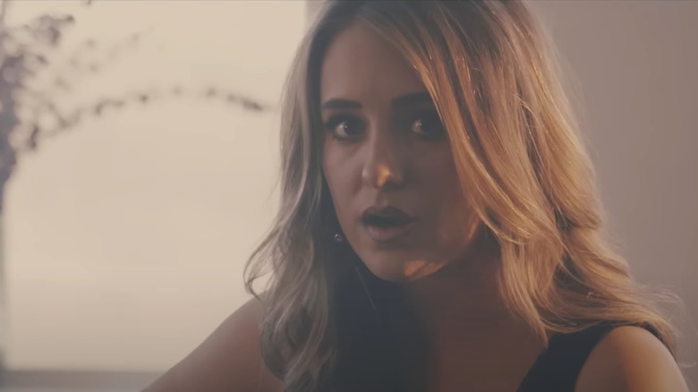 Lainey Wilson in the Tougher music video