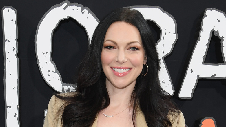 Actress Laura Prepon poses on the red carpet