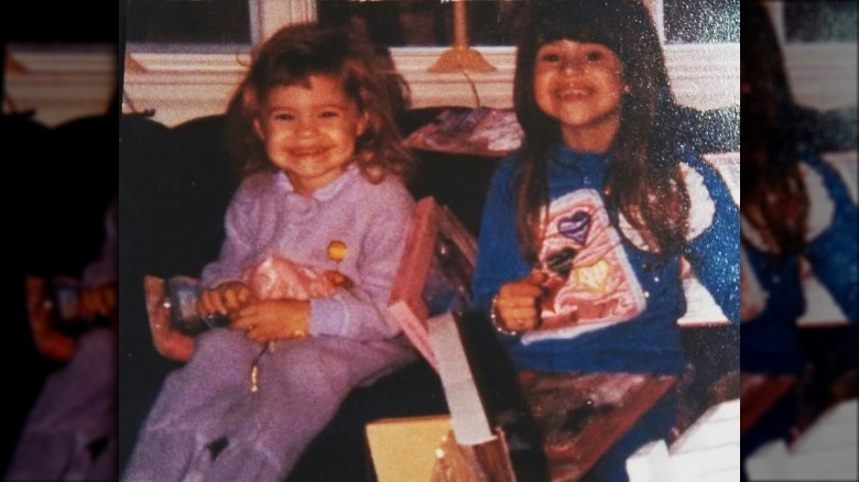 Lauren Hashian and her sister in their pajamas as kids