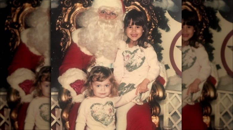 Lauren Hashian and her sister with Santa