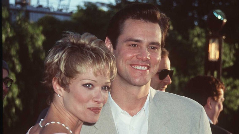 Lauren Holly and Jim Carrey at an event