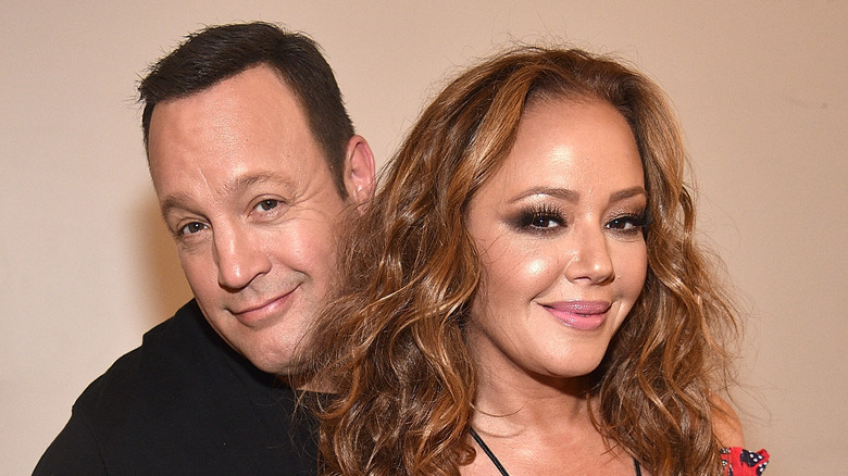 Kevin James and Leah Remini smiling