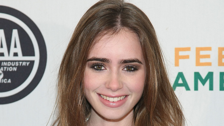 Lily Collins smiling 