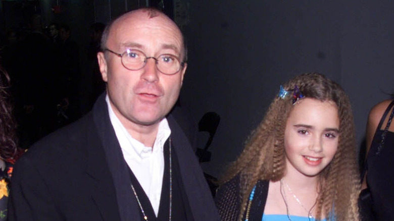 Lily Collins with dad Phil Collins