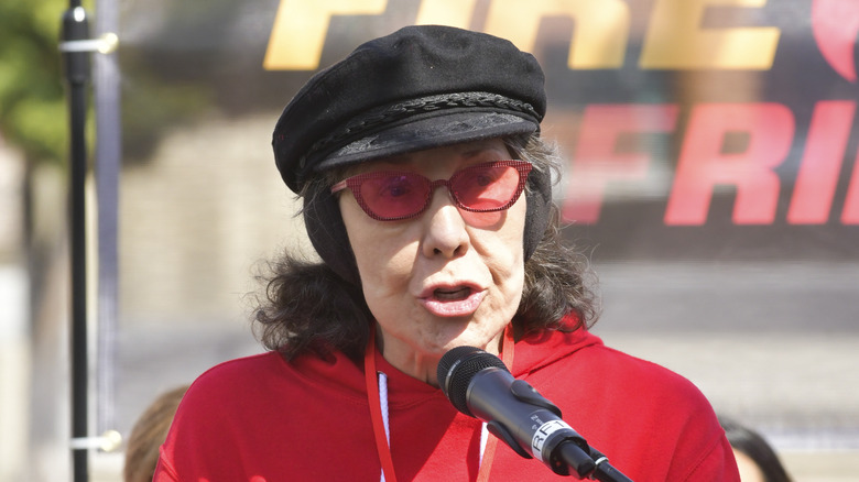 Lily Tomlin speaking to a crowd