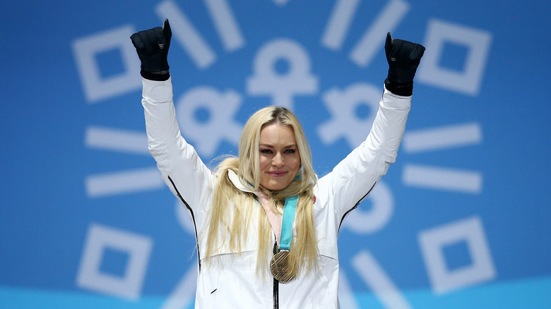 Lindsey Vonn raising her arms