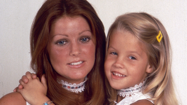 Priscilla and Little Lisa Marie in matching outfits