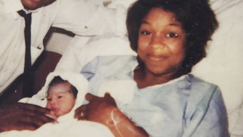 Newborn Lizzo with her parents