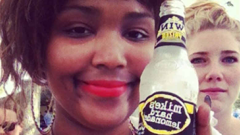 Lizzo in 2013 with a hard lemonade