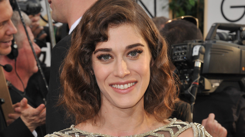 Lizzy Caplan smiling