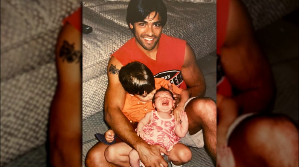 Mark Consuelos with baby Lola and Michael Consuelos