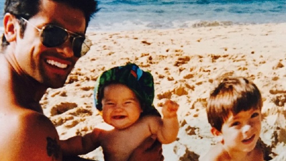 Mark Consuelos with baby Lola and Michael Consuelos