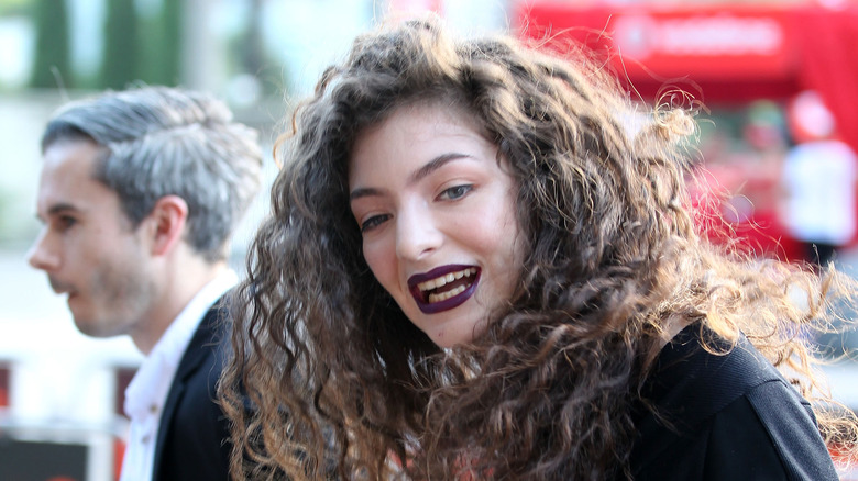 Lorde wearing dark lipstick