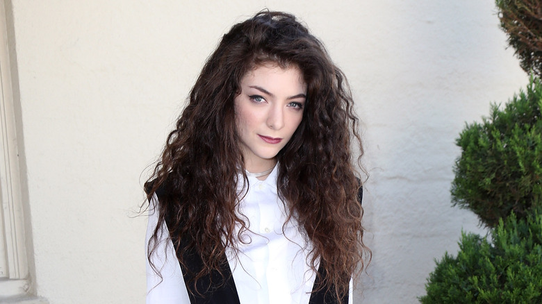 Lorde posing at an event