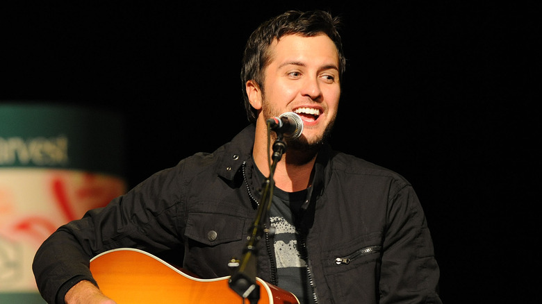 Luke Bryan with his guitar