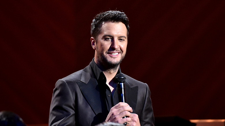 Luke Bryan speaking on stage