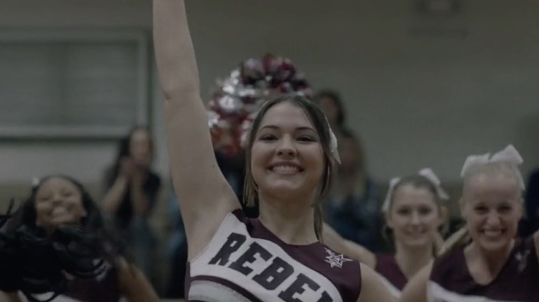 Madelyn Cline playing a cheerleader