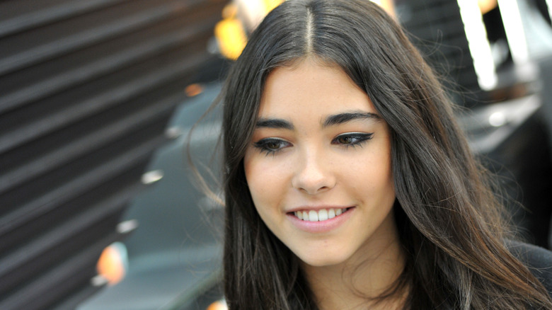 Madison Beer at an event, smiling