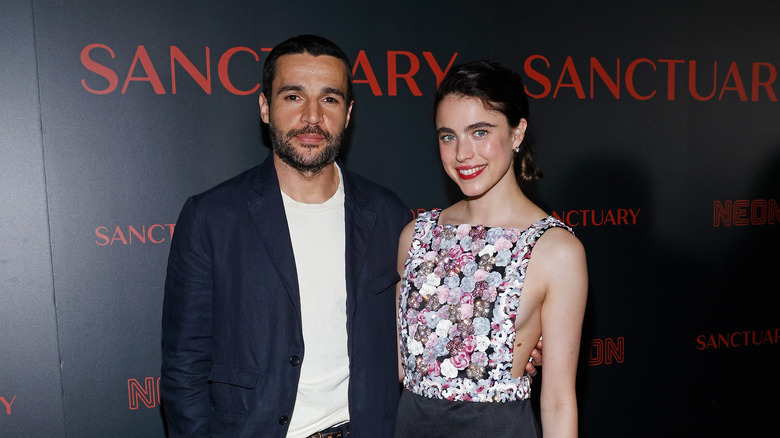 Christopher Abbott and Margaret Qualley attending a Sanctuary premiere