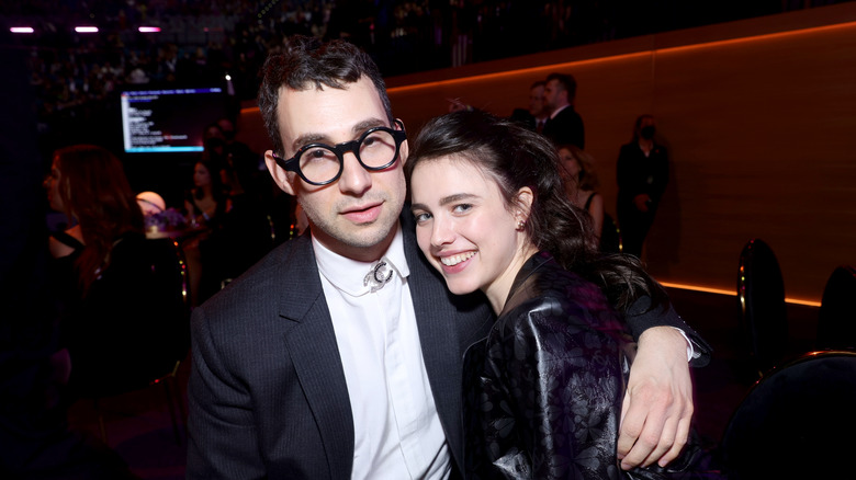 Jack Antonoff and Margaret Qualley posing and smiling