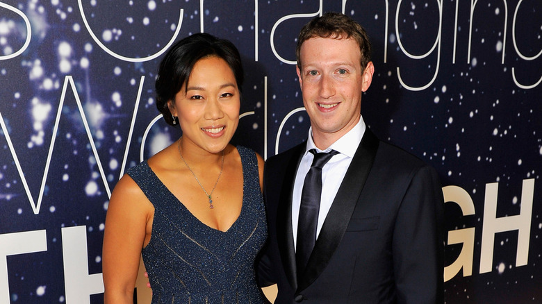 Priscilla Chan and Mark Zuckerberg smiling at the Breakthrough Prize Awards in 2014