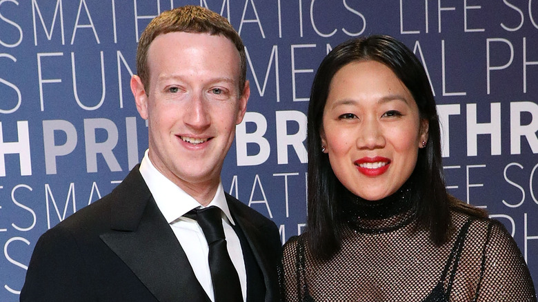 Priscilla Chan and Mark Zuckerberg smiling at the Breakthrough Prize ceremony in 2018