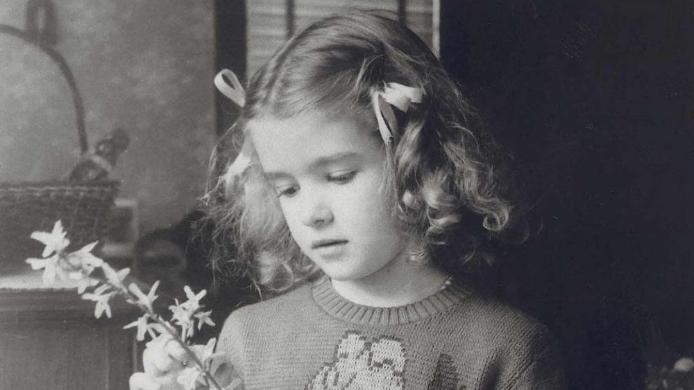 Martha Stewart as a young girl looking down