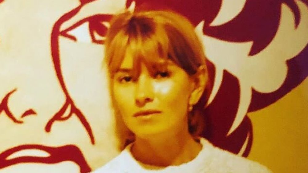 Martha Stewart as a young woman in front of a painting