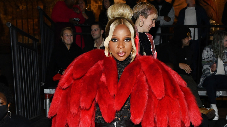 Mary J. Blige in a red coat