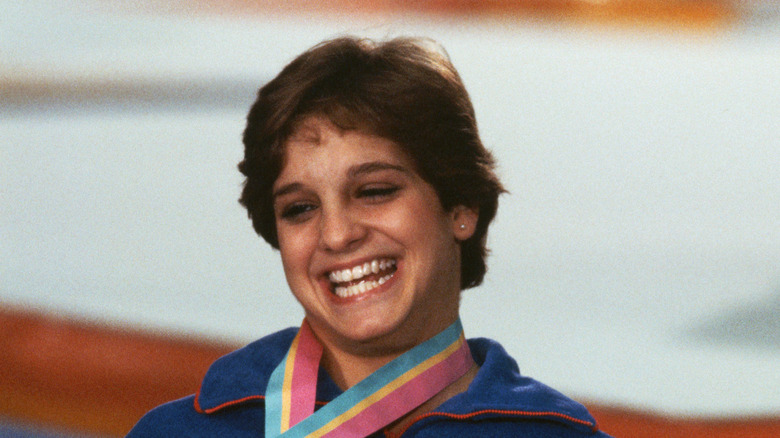 Mary Lou Retton with medals around neck