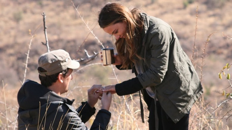 Miles Teller proposing to Keleigh Sperry among vegetated terrain