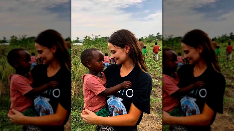 Keleigh Sperry holding a child in Africa