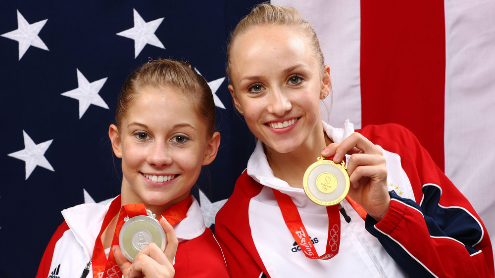 Nastia Liukin posing with Shawn Johnson