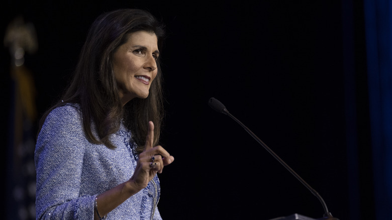 Nikki Haley speaking into a microphone