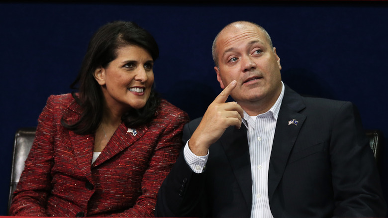 Nikki Haley and Michael Haley looking off to the side