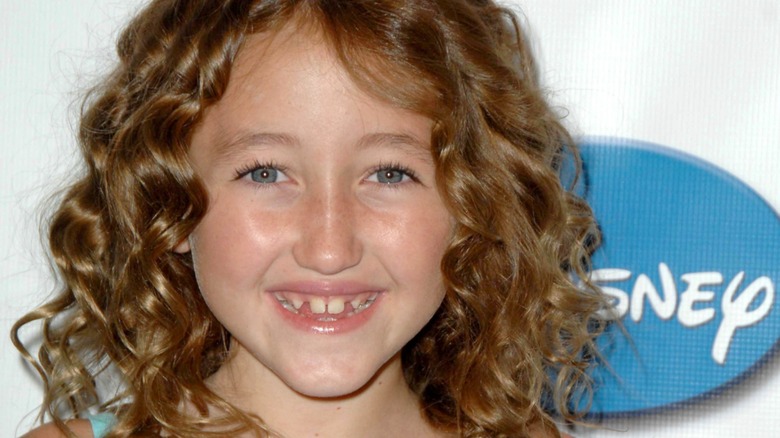 A young Noah Cyrus on red carpet