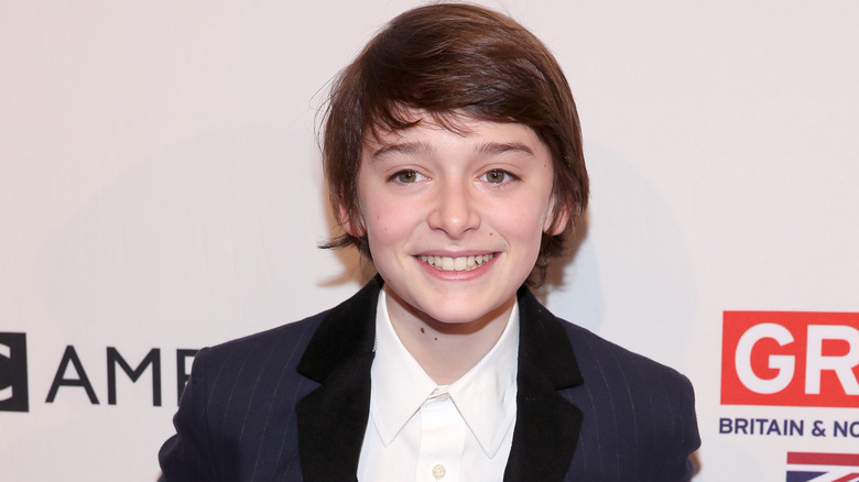 Noah Schnapp posing on red carpet