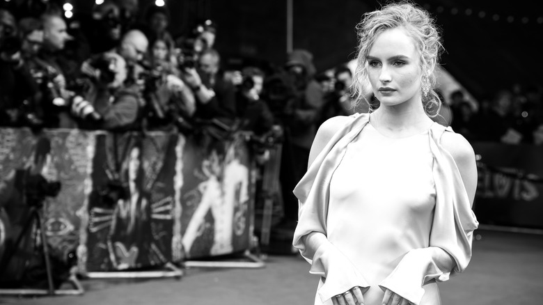 Olivia DeJonge on a red carpet