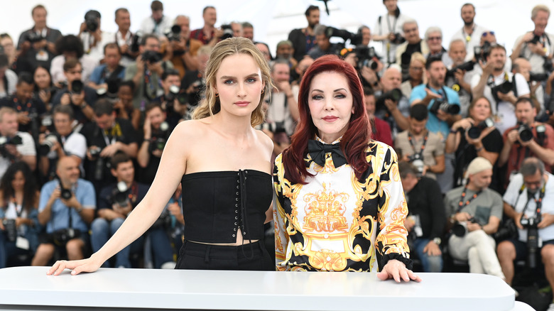 Olivia DeJonge and Priscilla Presley