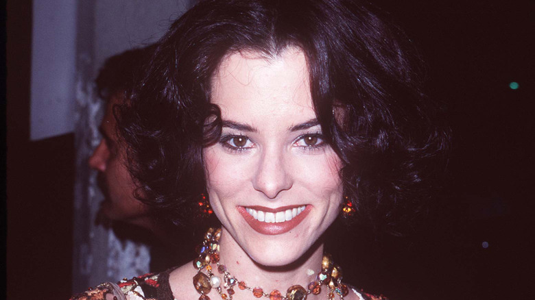 Parker Posey smiling at the premiere of The House of Yes