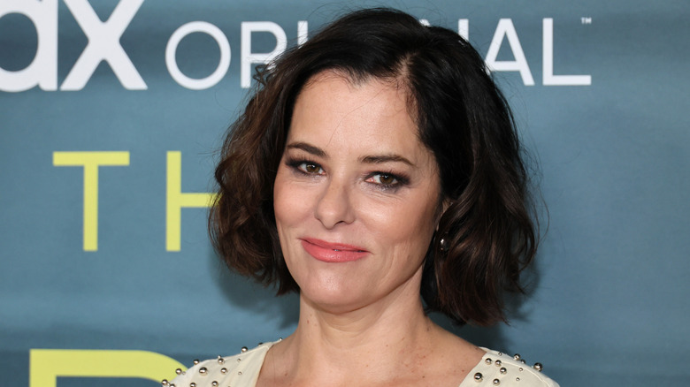 Parker Posey posing at the premiere of The Staircase